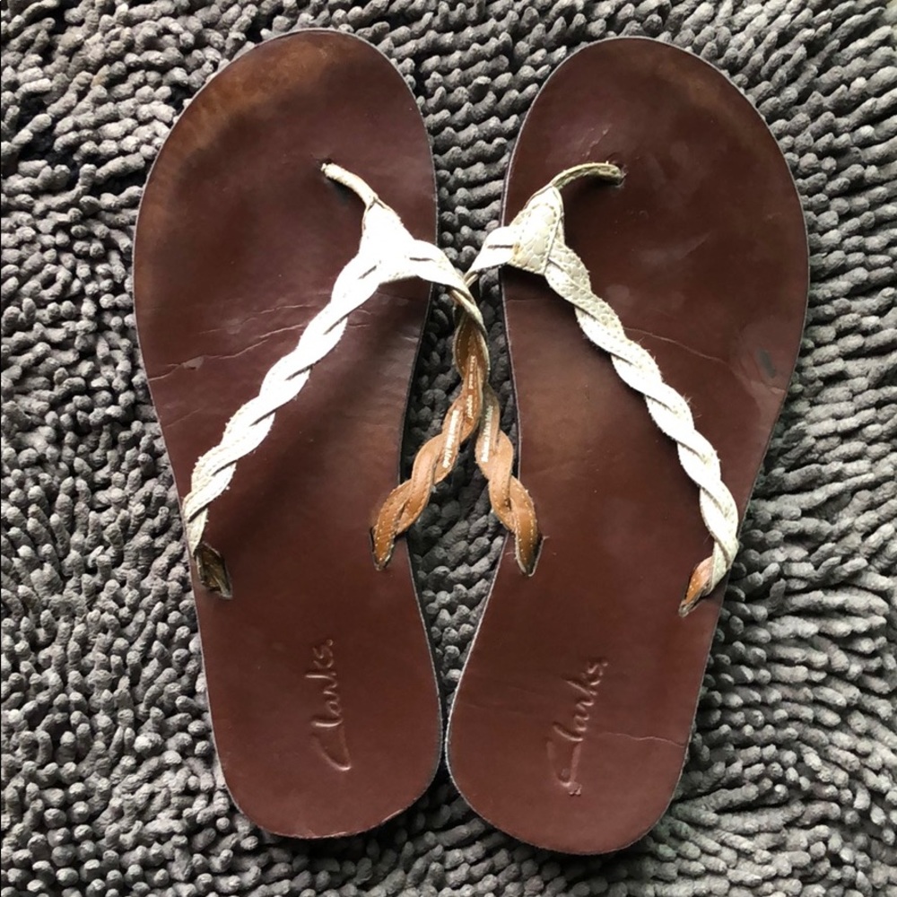 Women’s white dress flip flops.